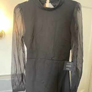 Black long elegant dress from Lulus open slip on the side of dress.